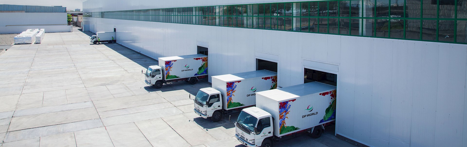 Branded trucks leaving warehouse