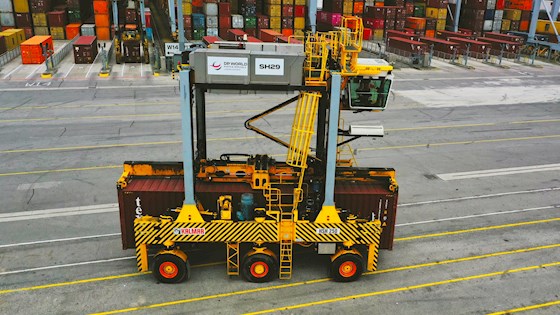 An electric straddle carrier at London Gateway